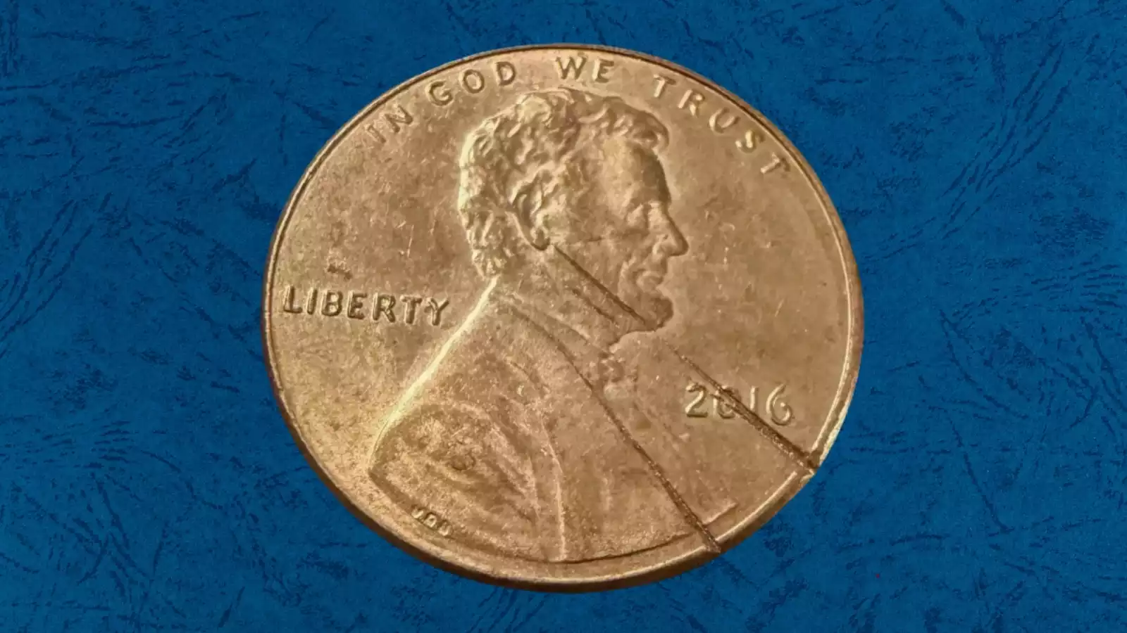2016 penny die crack and rim cud error showing raised blob of metal at rim where die steel broke away