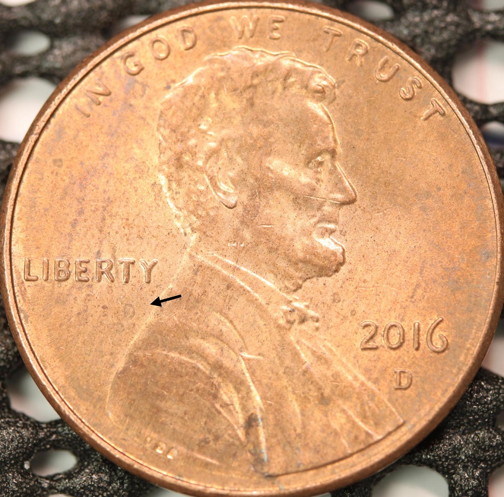 2016-D penny misplaced mint mark error showing D mint mark in an abnormal position below the date on Lincoln cent obverse